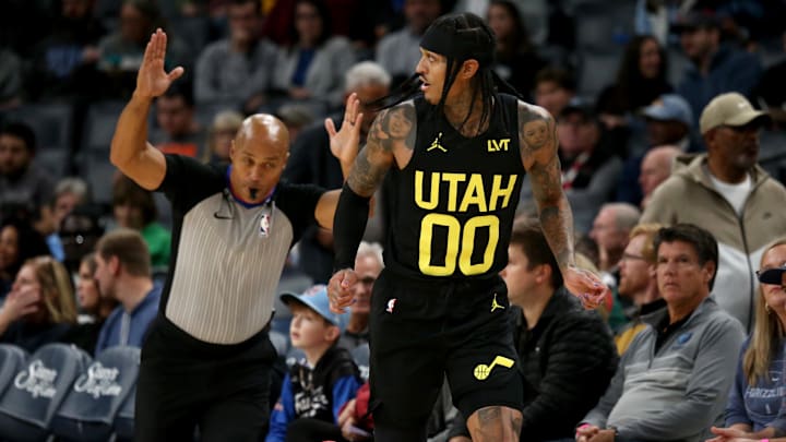 Nov 29, 2023; Memphis, Tennessee, USA; Utah Jazz guard Jordan Clarkson (00) reacts after a three-point basket during the first half against the Memphis Grizzlies at FedExForum. Mandatory Credit: Petre Thomas-Imagn Images