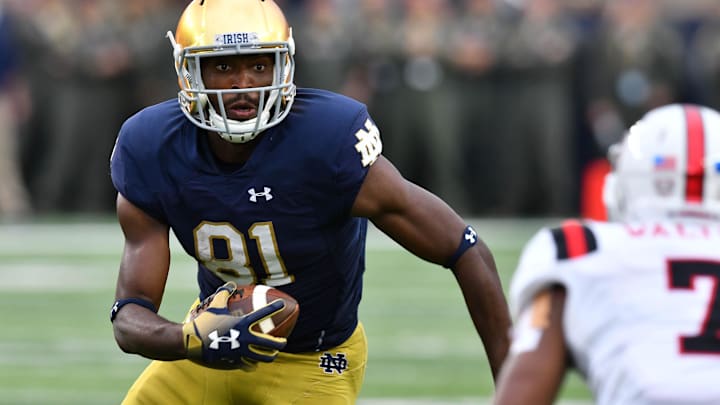 Sep 8, 2018; South Bend, IN, USA; Notre Dame Fighting Irish wide receiver Miles Boykin (81) carries in the third quarter against the Ball State Cardinals at Notre Dame Stadium. 