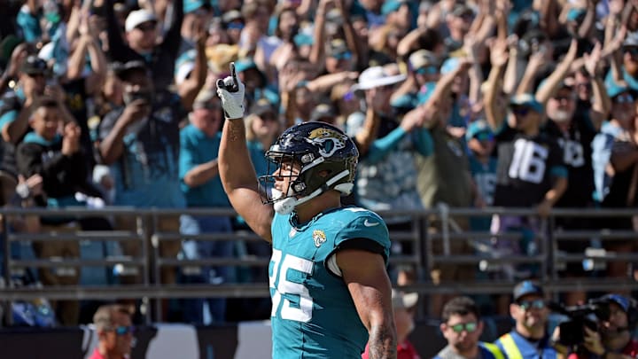 Oct 15, 2023; Jacksonville, Florida, USA; Jacksonville Jaguars tight end Brenton Strange (85) scores his first career touchdown during the game against the Indianapolis Colts at EverBank Stadium. Mandatory Credit: Melina Myers-Imagn Images