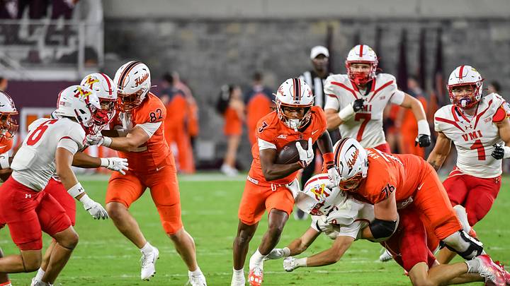 Sep 5, 2026; Blacksburg, Virginia, USA;  Virginia Tech Hokies wide receiver Que'sean Brown (3) runs after a catch as Virginia Tech Hokies tight end Benji Gosnell (82) blocks against the VMI Keydets during the third quarter at Lane Stadium.  Mandatory Credit: Brian Bishop-Imagn Images