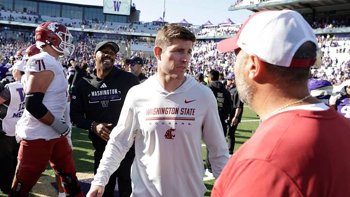 Washington State University football coach Kirby Moore comes on the field following the Apple Cup on Sunday at Husky Stadium. Washington State University football coach Kirby Moore comes on the field following the Apple Cup on Sunday at Husky Stadium.