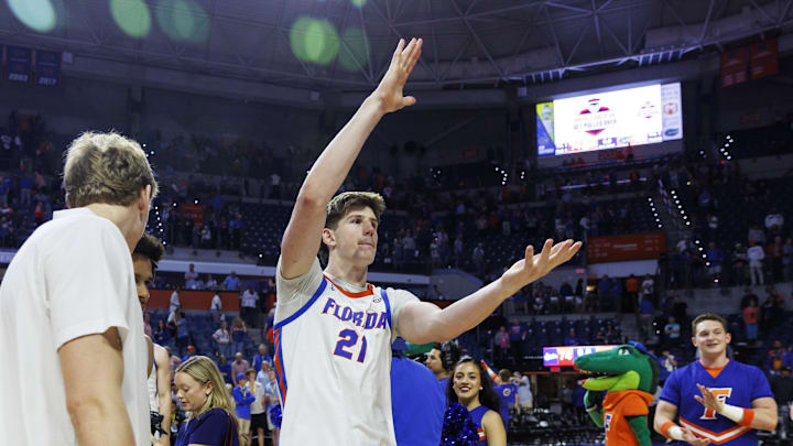 Mar 3, 2026; Gainesville, Florida, USA; Florida Gators forward Alex Condon (21) does the gator chomp after the game against the Mississippi State Bulldogs at Exactech Arena at the Stephen C. O'Connell Center. Mar 3, 2026; Gainesville, Florida, USA; Florida Gators forward Alex Condon (21) does the gator chomp after the game against the Mississippi State Bulldogs at Exactech Arena at the Stephen C. O'Connell Center.