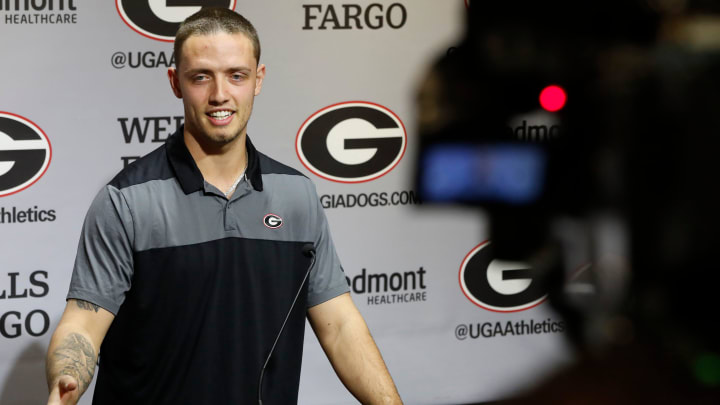 Georgia quarterback Carson Beck speaks to the media on the first day of spring practice in Athens, Ga., on Tuesday, March 12, 2024.