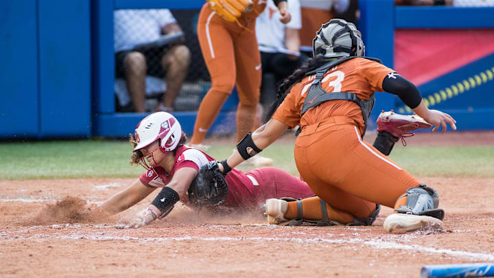 Oklahoma's Alyssa Brito slides in ahead of the tag.