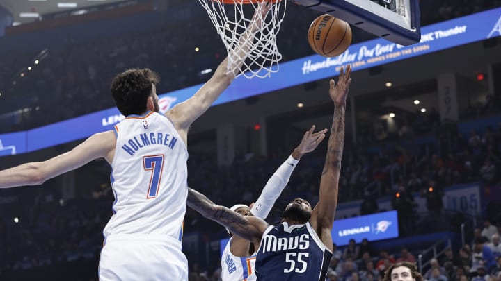 Mar 14, 2024; Oklahoma City, Oklahoma, USA; Dallas Mavericks forward Derrick Jones Jr. (55) shoots