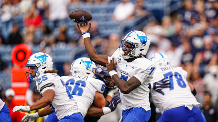 Sep 28, 2024; East Hartford, Connecticut, USA; Buffalo Bulls quarterback C.J. Ogbonna (7) throws a pass against the Connecticut Huskies in the second quarter at Rentschler Field at Pratt & Whitney Stadium. Mandatory Credit: David Butler II-Imagn Images