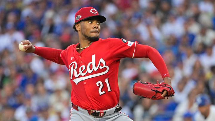 Sep 30, 2025; Los Angeles, California, USA; Cincinnati Reds starting pitcher Hunter Greene (21) throws a pitch during the first inning against the Los Angeles Dodgers during game one of the Wildcard round for the 2025 MLB playoffs at Dodger Stadium. Mandatory Credit: Jayne Kamin-Oncea-Imagn Images