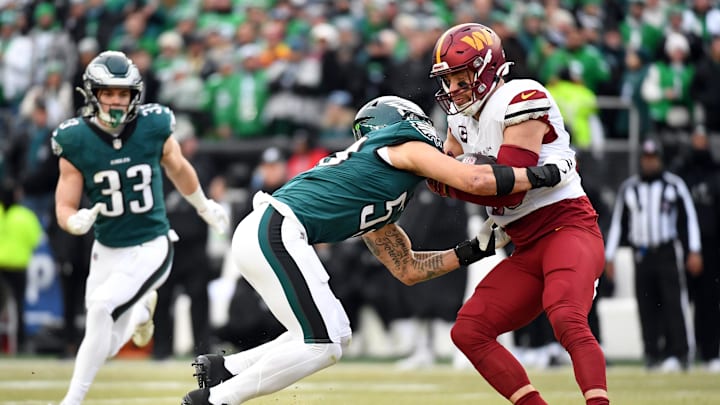 Jan 26, 2025; Philadelphia, PA, USA; Philadelphia Eagles linebacker Zack Baun (53) tackles Washington Commanders tight end Zach Ertz (86) during the first half in the NFC Championship game at Lincoln Financial Field. Mandatory Credit: Eric Hartline-Imagn Images