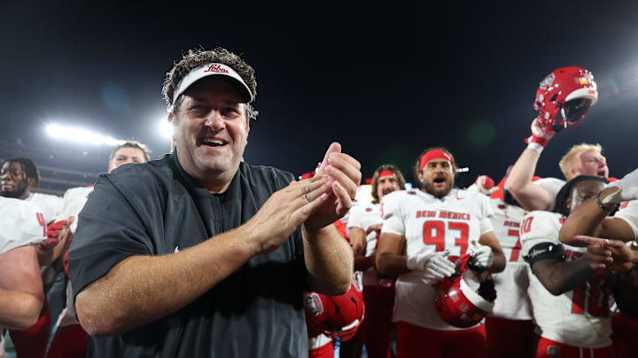 Sep 12, 2025; Pasadena, California, USA;  New Mexico Lobos head coach Jason Eck celebrates with his players after defeating the UCLA Bruins 35-10 at the Rose Bowl. Mandatory Credit: Kiyoshi Mio-Imagn Images