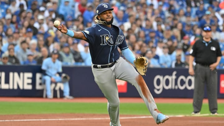 Sep 30, 2023; Toronto, Ontario, CAN; Tampa Bay Rays third baseman Junior Caminero (1) throws out Toronto Blue Jays first baseman Vladimir Guerrero Jr (not pictured) in the seventh inning at Rogers Centre. Sep 30, 2023; Toronto, Ontario, CAN; Tampa Bay Rays third baseman Junior Caminero (1) throws out Toronto Blue Jays first baseman Vladimir Guerrero Jr (not pictured) in the seventh inning at Rogers Centre.