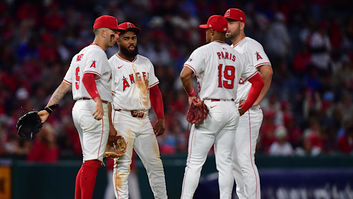 Jun 7, 2024; Anaheim, California, USA; Los Angeles Angels shortstop Zach Neto (9) second base Luis Rengifo (2) second base Kyren Paris (19) and first base Nolan Schanuel (18) meet during a pitching change in the seventh inning at Angel Stadium. Mandatory Credit: Gary A. Vasquez-Imagn Images