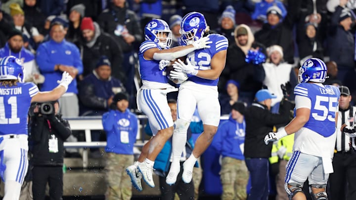 Hinckley Ropati and Ray Paulo celebrate against Kansas
