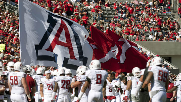 Oct 24, 2015; Tucson, AZ, USA; Arizona Wildcats flags are displayed during first half against the Washington State Cougars at Arizona Stadium. The Cougars won 45-42. Mandatory Credit: Casey Sapio-Imagn Images