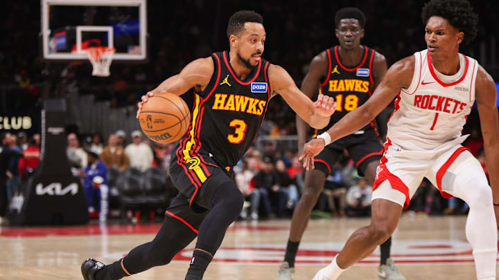 Jan 29, 2026; Atlanta, Georgia, USA; Atlanta Hawks guard CJ McCollum (3) drives to the basket against the Houston Rockets in the second quarter at State Farm Arena. Mandatory Credit: Brett Davis-Imagn Images
