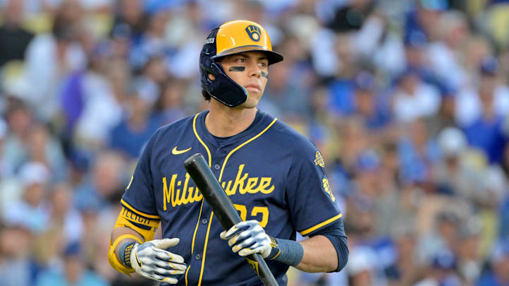 Oct 16, 2025; Los Angeles, California, USA; Milwaukee Brewers left fielder Christian Yelich (22) reacts after striking out against the Los Angeles Dodgers in the sixth inning during game three of the NLCS round for the 2025 MLB playoffs at Dodger Stadium. Mandatory Credit: Jayne Kamin-Oncea-Imagn Images