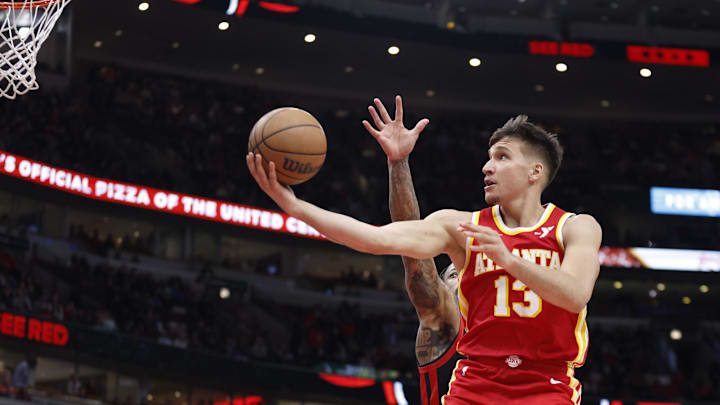 Apr 1, 2024; Chicago, Illinois, USA; Atlanta Hawks guard Bogdan Bogdanovic (13) drives to the basket Apr 1, 2024; Chicago, Illinois, USA; Atlanta Hawks guard Bogdan Bogdanovic (13) drives to the basket