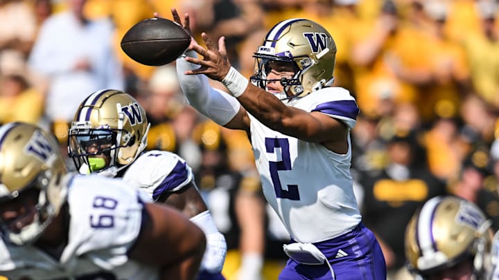 Oct 12, 2024; Iowa City, Iowa, USA; Washington Huskies quarterback Demond Williams Jr. (2) takes a direct snap against the Iowa Hawkeyes during the second quarter at Kinnick Stadium. Mandatory Credit: Jeffrey Becker-Imagn Images