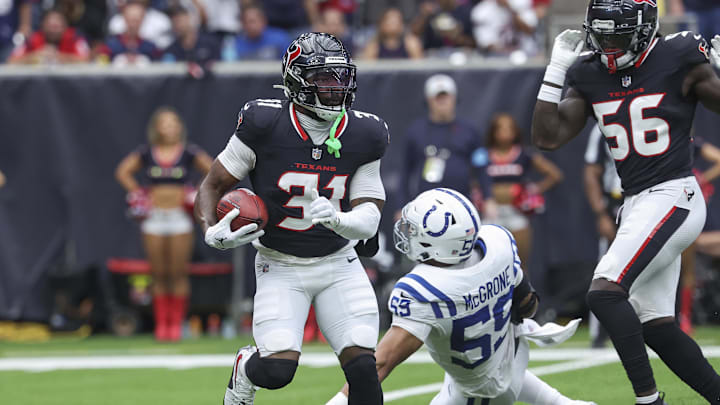 Oct 27, 2024; Houston, Texas, USA; Houston Texans running back Dameon Pierce (31) runs with the ball on the opening kickoff during the first quarter against the Indianapolis Colts at NRG Stadium.