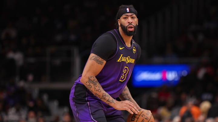 Dec 6, 2024; Atlanta, Georgia, USA; Los Angeles Lakers forward Anthony Davis (3) dribbles against the Atlanta Hawks in the second quarter at State Farm Arena. Mandatory Credit: Brett Davis-Imagn Images
