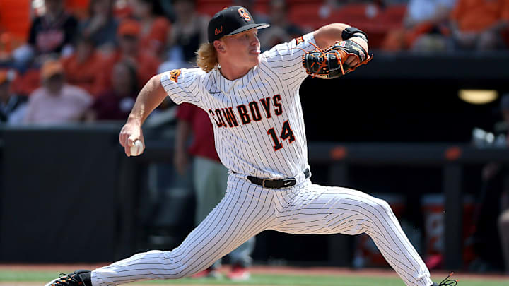 Oklahoma State's Brian Holiday (14) pitches during a Bedlam baseball game between the Oklahoma State