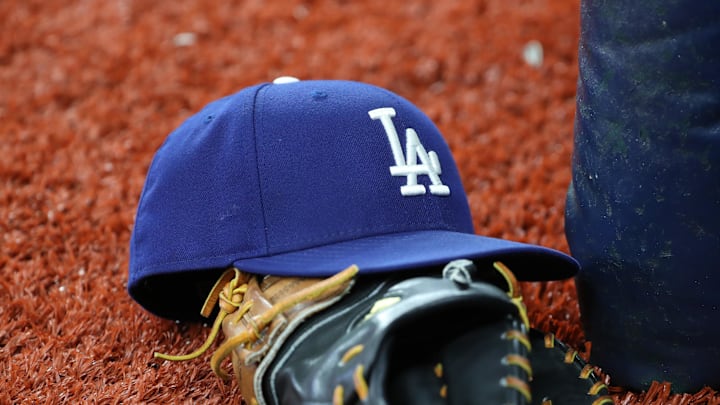 A detail view of Los Angeles Dodgers hat and glove at Tropicana Field on May 21, 2019. A detail view of Los Angeles Dodgers hat and glove at Tropicana Field on May 21, 2019.