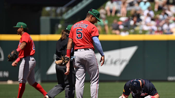 Atlanta Braves left fielder Jarred Kelenic (24) reacts after being  tagged out by Boston Red Sox second baseman Vaughn Grissom (5) in the third inning during spring training at CoolToday Park on March 17.