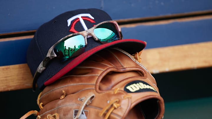 Detroit, MI, USA; Minnesota Twins hat and glove in the dugout during the game against the Minnesota Twins at Comerica Park.