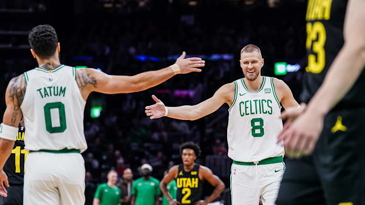 Jan 5, 2024; Boston, Massachusetts, USA;Boston Celtics center Kristaps Porzingis (8) and forward Jayson Tatum (0) react after a play against the Utah Jazz in the second quarter at TD Garden. Mandatory Credit: David Butler II-Imagn Images Jan 5, 2024; Boston, Massachusetts, USA;Boston Celtics center Kristaps Porzingis (8) and forward Jayson Tatum (0) react after a play against the Utah Jazz in the second quarter at TD Garden. Mandatory Credit: David Butler II-Imagn Images