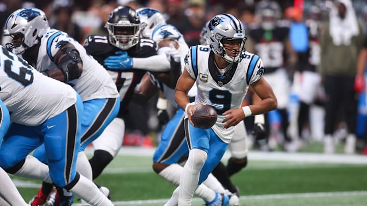 Nov 16, 2025; Atlanta, Georgia, USA; Carolina Panthers quarterback Bryce Young (9) hands the ball off in the fourth quarter against the Atlanta Falcons at Mercedes-Benz Stadium. Mandatory Credit: Brett Davis-Imagn Images