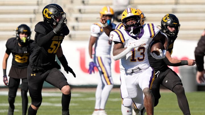 Dec 6, 2024; Birmingham, AL, USA; Cherokee County's Dylan Duncan (51) pursues Jackson's Ezavier Crowell (13) at Protective Stadium in the AHSAA 4A State Championship game.
