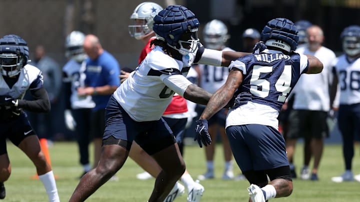 Dallas Cowboys tackle Tyler Guyton blocks EDGE Sam Williams during training camp at the River Ridge Playing Fields.