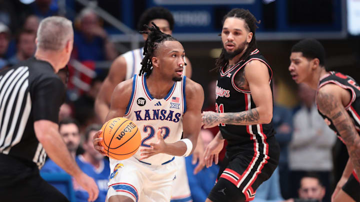 Kansas Jayhawks guard Darryn Peterson (22) looks for an open pass against Houston Cougars during the game inside Allen Fieldhouse on Monday, Feb. 23, 2026.