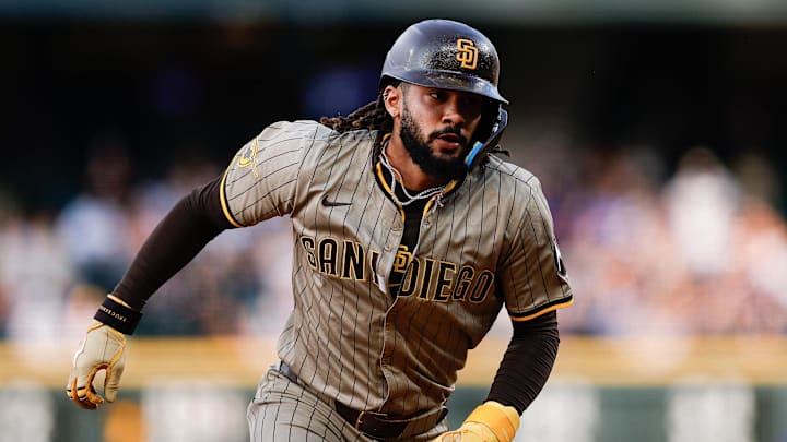 May 9, 2025; Denver, Colorado, USA; San Diego Padres right fielder Fernando Tatis Jr. (23) runs towards third as he scores on an RBI in the third inning against the Colorado Rockies at Coors Field. Mandatory Credit: Isaiah J. Downing-Imagn Images May 9, 2025; Denver, Colorado, USA; San Diego Padres right fielder Fernando Tatis Jr. (23) runs towards third as he scores on an RBI in the third inning against the Colorado Rockies at Coors Field. Mandatory Credit: Isaiah J. Downing-Imagn Images