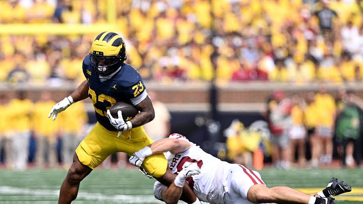 Sep 12, 2026; Ann Arbor, Michigan, USA; Oklahoma Sooners linebacker Owen Heinecke (38) tackles Michigan Wolverines running back Jordan Marshall (23) during the second quarter at Michigan Stadium. Mandatory Credit: Lon Horwedel-Imagn Images Sep 12, 2026; Ann Arbor, Michigan, USA; Oklahoma Sooners linebacker Owen Heinecke (38) tackles Michigan Wolverines running back Jordan Marshall (23) during the second quarter at Michigan Stadium. Mandatory Credit: Lon Horwedel-Imagn Images
