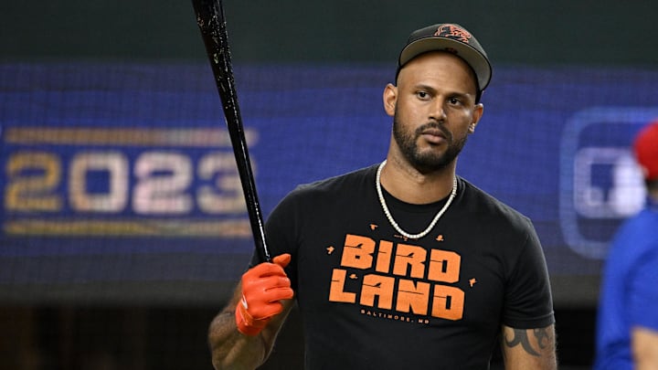 Oct 10, 2023; Arlington, Texas, USA; Baltimore Orioles center fielder Aaron Hicks (34) warms up before game three against the Texas Rangers in the ALDS for the 2023 MLB playoffs at Globe Life Field. Mandatory Credit: Jerome Miron-USA TODAY Sports