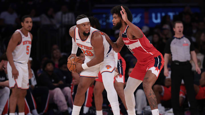 Oct 13, 2025; New York, New York, USA; New York Knicks forward Guerschon Yabusele (28) shields the ball from Washington Wizards forward Marvin Bagley III (35) during the second half at Madison Square Garden. Mandatory Credit: Vincent Carchietta-Imagn Images Oct 13, 2025; New York, New York, USA; New York Knicks forward Guerschon Yabusele (28) shields the ball from Washington Wizards forward Marvin Bagley III (35) during the second half at Madison Square Garden. Mandatory Credit: Vincent Carchietta-Imagn Images
