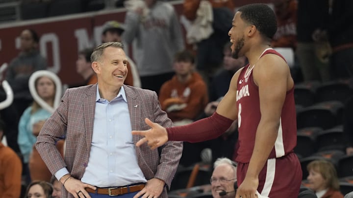 Feb 11, 2025; Austin, Texas, USA; Alabama Crimson Tide head coach Nate Oats enjoys a laugh with guard Chris Youngblood (8) during the second half against the Texas Longhorns at Moody Center. Mandatory Credit: Scott Wachter-Imagn Images Feb 11, 2025; Austin, Texas, USA; Alabama Crimson Tide head coach Nate Oats enjoys a laugh with guard Chris Youngblood (8) during the second half against the Texas Longhorns at Moody Center. Mandatory Credit: Scott Wachter-Imagn Images