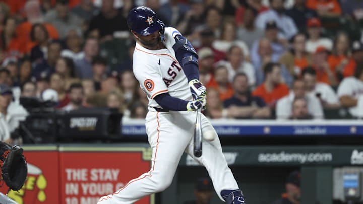Apr 29, 2025; Houston, Texas, USA; Houston Astros first baseman Christian Walker (8) hits an RBI double during the sixth inning against the Detroit Tigers at Daikin Park.