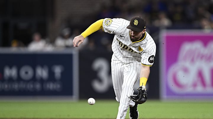 Aug 24, 2024; San Diego, California, USA; San Diego Padres shortstop Mason McCoy (18) fields a ground ball during the eighth inning against the New York Mets at Petco Park. Mandatory Credit: Orlando Ramirez-Imagn Images Aug 24, 2024; San Diego, California, USA; San Diego Padres shortstop Mason McCoy (18) fields a ground ball during the eighth inning against the New York Mets at Petco Park. Mandatory Credit: Orlando Ramirez-Imagn Images
