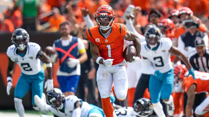 Cincinnati Bengals wide receiver Ja'Marr Chase (1) breaks away for a long run on a reception in the second quarter of the NFL Week 2 game between the Cincinnati Bengals and the Jacksonville Jaguars at Paycor Stadium in downtown Cincinnati on Sunday, Sept. 14, 2025. The Jaguars led 17-10 at halftime.
