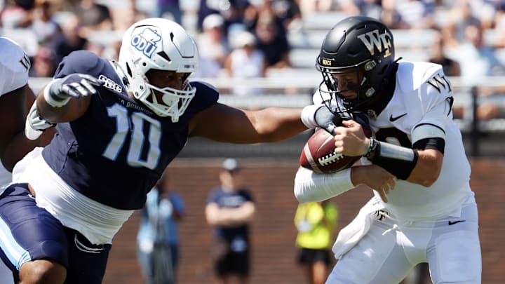 Sep 16, 2023; Norfolk, Virginia, USA; Old Dominion Monarchs defensive tackle Jalen Satchell (10) causing a Wake Forest Demon Deacons quarterback Mitch Griffis (12) to fumble during the first quarter at Kornblau Field at S.B. Ballard Stadium. Mandatory Credit: Peter Casey-USA TODAY Sports