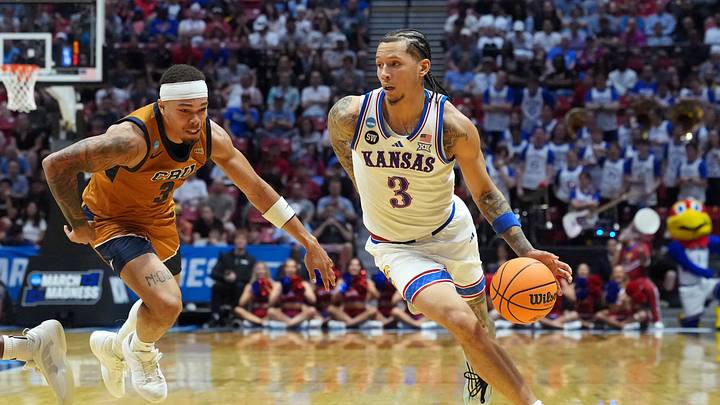 Mar 20, 2026; San Diego, CA, USA; Kansas Jayhawks guard Tre White (3) controls the ball against California Baptist Lancers guard Jayden Jackson (3) in the first half during a first round game of the men's 2026 NCAA Tournament at Viejas Arena. Mandatory Credit: Kirby Lee-Imagn Images Mar 20, 2026; San Diego, CA, USA; Kansas Jayhawks guard Tre White (3) controls the ball against California Baptist Lancers guard Jayden Jackson (3) in the first half during a first round game of the men's 2026 NCAA Tournament at Viejas Arena. Mandatory Credit: Kirby Lee-Imagn Images