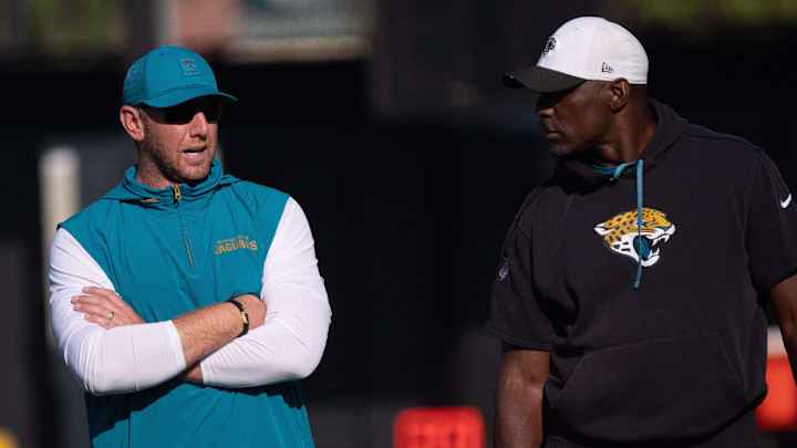 Jacksonville Jaguars Head Coach Liam Coen, left, talks with Assistant Strength and Conditioning Coach Julian Whitehead during the Jacksonville Jaguars’ 18th and final training camp practice at Miller Electric Center in Jacksonville, Fla. Wednesday August 20, 2025. [Doug Engle/Florida Times-Union]