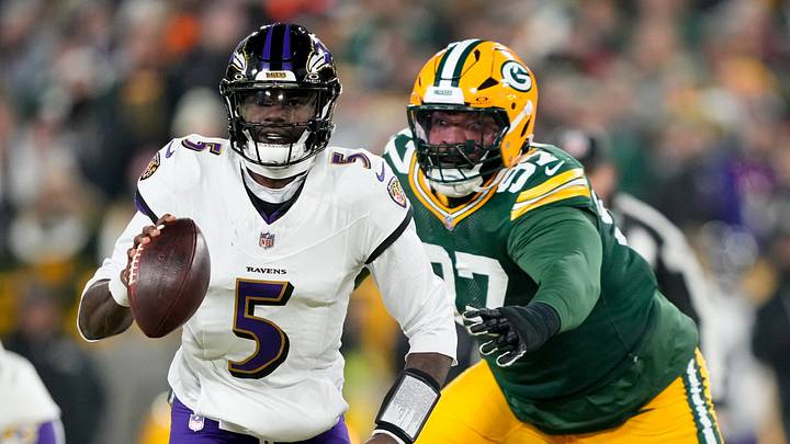 Dec 27, 2025; Green Bay, Wisconsin, USA; Baltimore Ravens quarterback Tyler Huntley (5) looks to throw a pass as Green Bay Packers defensive tackle Jordon Riley (97) defends during the first quarter at Lambeau Field. Mandatory Credit: Kayla Wolf-Imagn Images Dec 27, 2025; Green Bay, Wisconsin, USA; Baltimore Ravens quarterback Tyler Huntley (5) looks to throw a pass as Green Bay Packers defensive tackle Jordon Riley (97) defends during the first quarter at Lambeau Field. Mandatory Credit: Kayla Wolf-Imagn Images