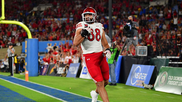 Utah Utes tight end Dallen Bentley (88) scores a touchdown against the UCLA Bruins during the second half at Rose Bowl. Utah Utes tight end Dallen Bentley (88) scores a touchdown against the UCLA Bruins during the second half at Rose Bowl.