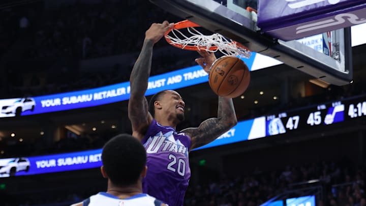 Nov 14, 2024; Salt Lake City, Utah, USA; Utah Jazz forward John Collins (20) dunks the ball against the Dallas Mavericks during the second quarter at Delta Center. Mandatory Credit: Rob Gray-Imagn Images