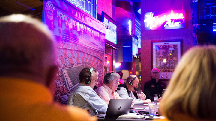 At center Bob Kesling of \"Vol Calls\"speaks while on the air at Calhoun's on the River in Knoxville, Wednesday, Oct. 24, 2019. Kesling has hosted the show for 20 years.

Volcalls1023 0027