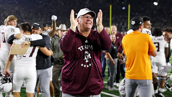 Sep 13, 2025; South Bend, Indiana, USA; Texas A&M Aggies head coach Mike Elko celebrates after the game against Notre Dame Fighting Irish at Notre Dame Stadium. Mandatory Credit: Trevor Ruszkowski-Imagn Images Sep 13, 2025; South Bend, Indiana, USA; Texas A&M Aggies head coach Mike Elko celebrates after the game against Notre Dame Fighting Irish at Notre Dame Stadium. Mandatory Credit: Trevor Ruszkowski-Imagn Images