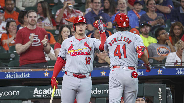Jun 3, 2024; Houston, Texas, USA; St. Louis Cardinals right fielder Alec Burleson (41) celebrates with second baseman Nolan Gorman (16) after hitting a home run during the first inning against the Houston Astros at Minute Maid Park. Mandatory Credit: Troy Taormina-Imagn Images