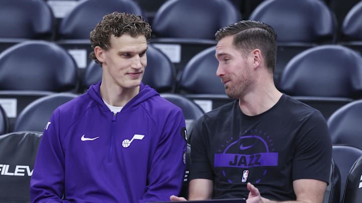 Nov 30, 2025; Salt Lake City, Utah, USA; Utah Jazz forward Lauri Markkanen. left, prepares for the game against the Houston Rockets with assistant coach Sean Sheldon, right,  at Delta Center. Mandatory Credit: Rob Gray-Imagn Images